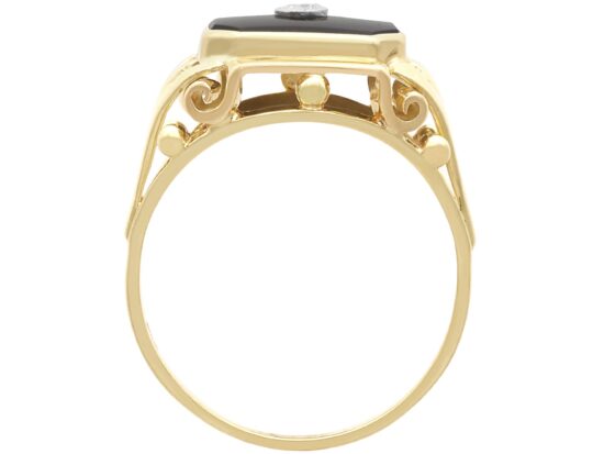 setting of Vintage Diamond and Onyx Signet Ring in Gold