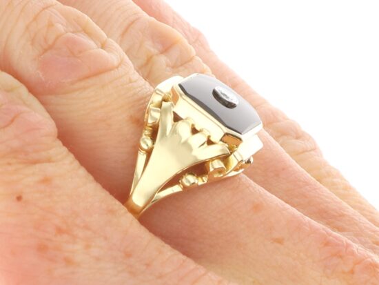 Vintage Diamond and Onyx Signet Ring in Gold on hand