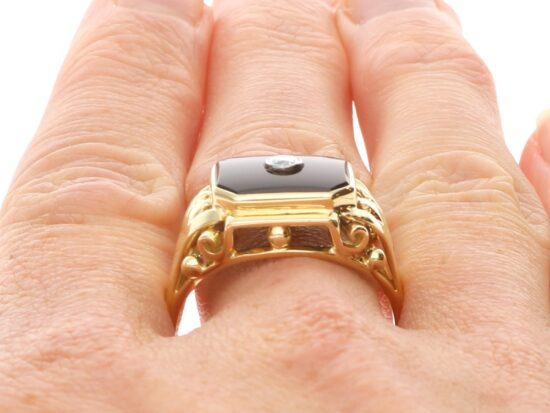 Vintage Diamond and Onyx Signet Ring in Gold on finger