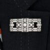 wearing rectangular art deco diamond brooch