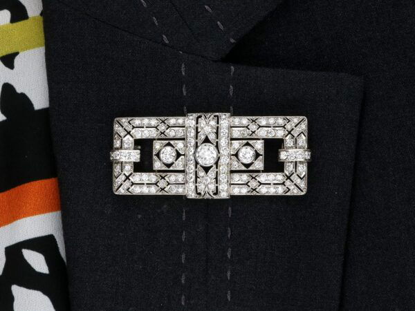 wearing rectangular art deco diamond brooch