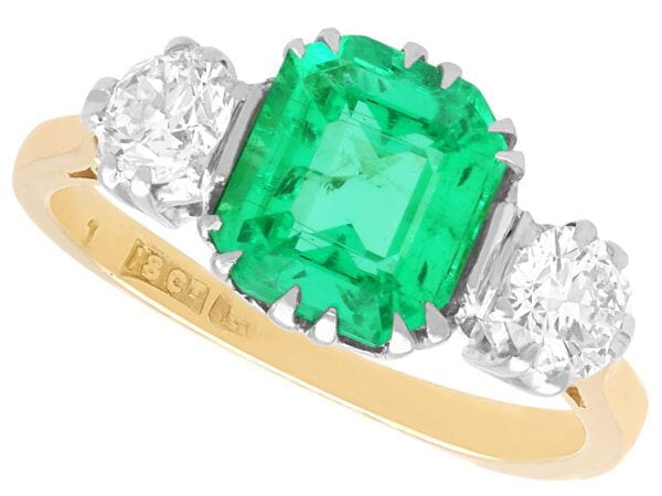 emerald trilogy engagement ring in gold