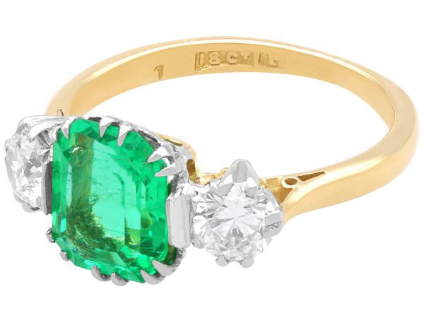 emerald trilogy engagement ring in yellow gold
