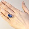cushion cut Ceylon sapphire ring on hand