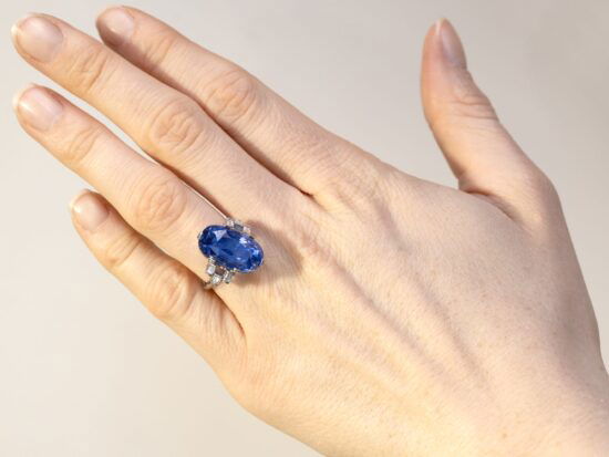 cushion cut Ceylon sapphire ring on hand