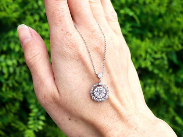 halo diamond pendant necklace in platinum outside