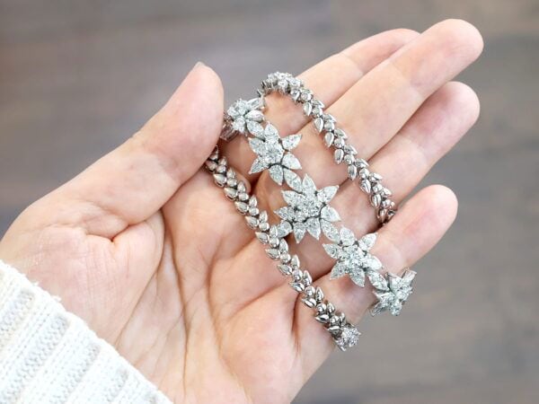 statement floral diamond necklace in the hand