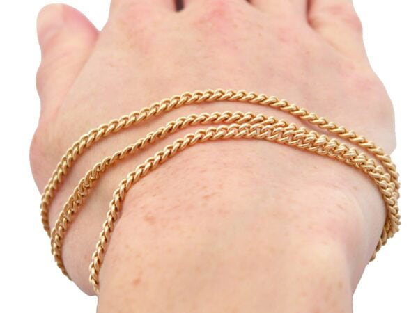 Yellow Gold Chain On Wrist Shot