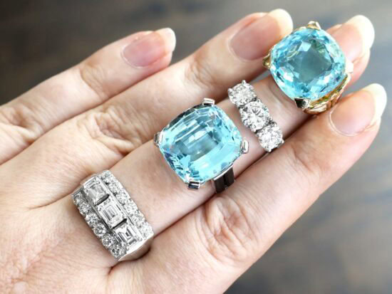 gemstone rings stacked on finger