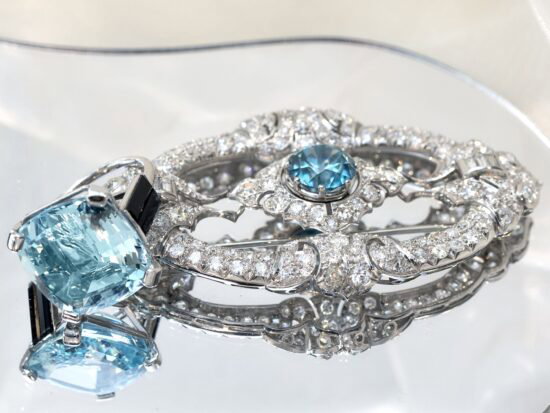 gemstone ring and brooch