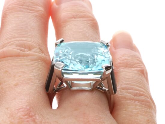 Aquamarine Ring with Onyx on finger