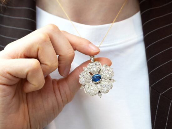 Late 19th Century Sapphire and Diamond Floral pendant wearing