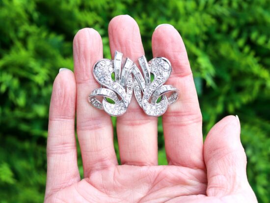 Day Earrings Held In Hand