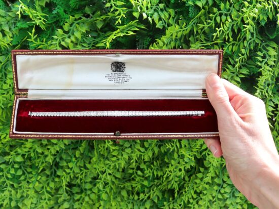 boxed Luxury 14 carat Diamond Line Bracelet in Platinum outside