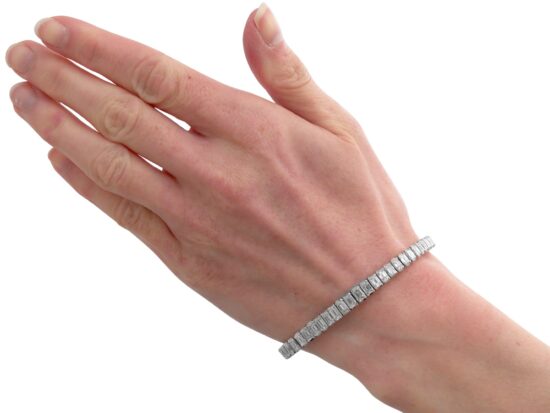 wearing Luxury 14 carat Diamond Line Bracelet in Platinum