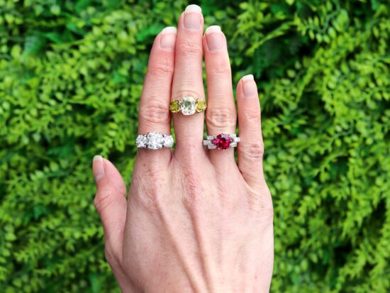 Diamond and Gemstone Rings on Hand
