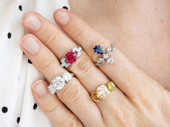 Diamond and Gemstone Rings on Fingers