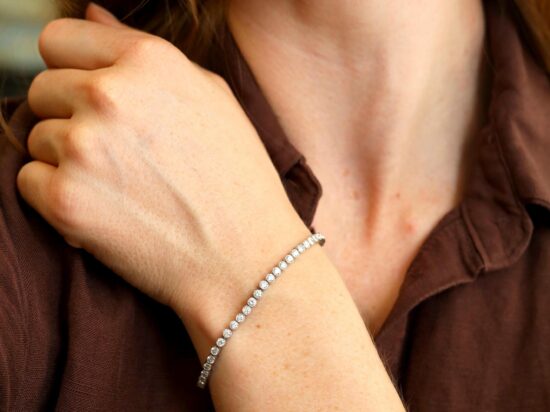 Wearing Diamond Platinum Tennis Bracelet