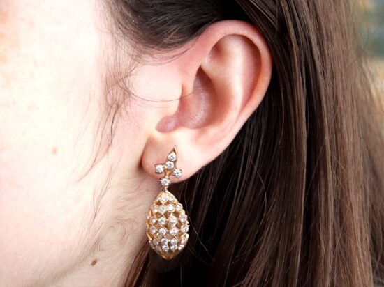 Vintage Diamond Earrings Being Worn