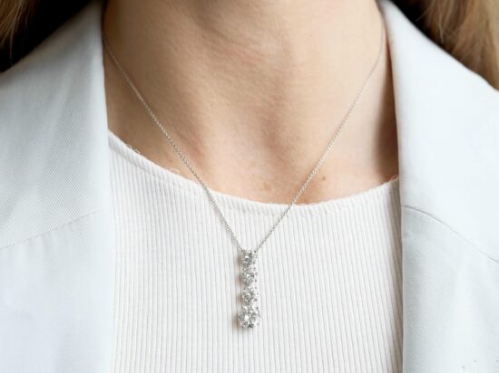 Vintage Diamond Pendant Being Worn