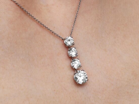 Platinum Necklace Wearing Detail Shot
