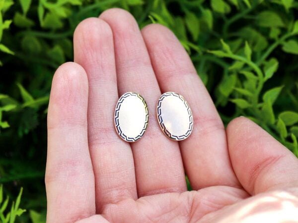 antique enamel and gold cufflinks outside