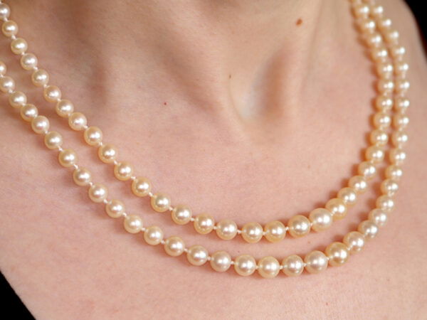 double strand pearl necklace on neck