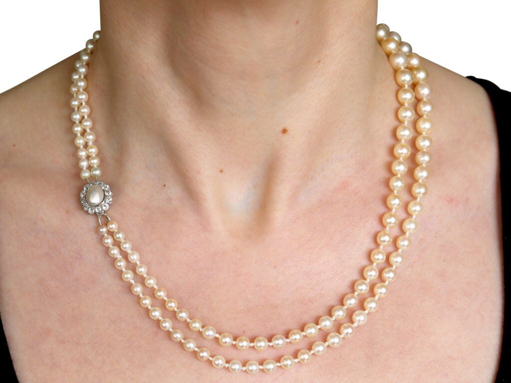 double strand pearl necklace on neck