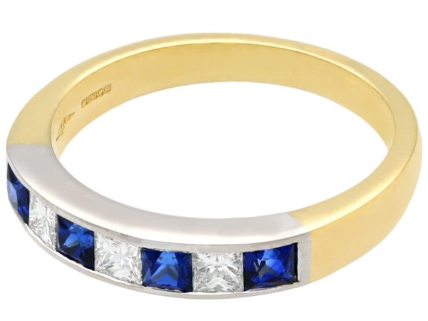 diamond and sapphire eternity ring in white and yellow gold