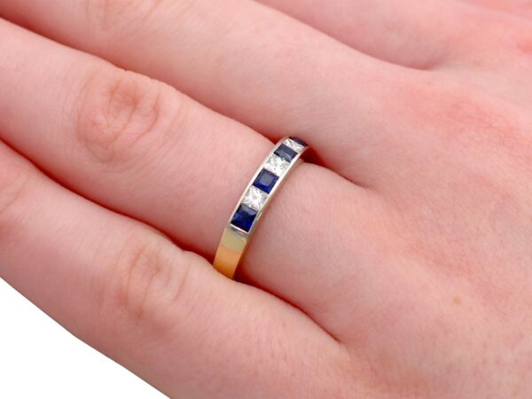 wearing diamond and sapphire eternity ring