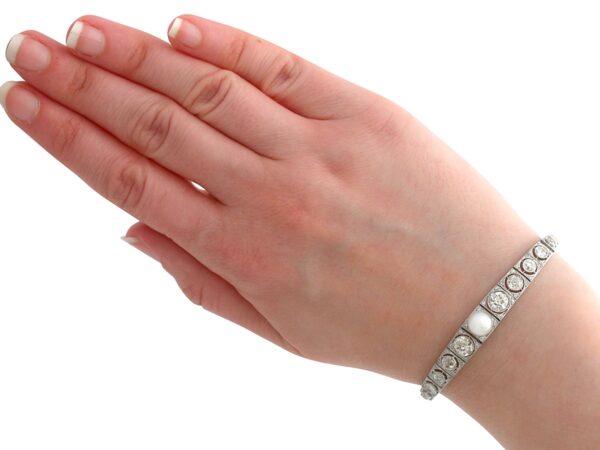 diamond and pearl line bracelet white gold on wrist
