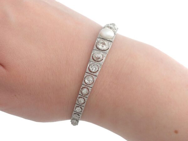 wearing diamond and pearl line bracelet white gold