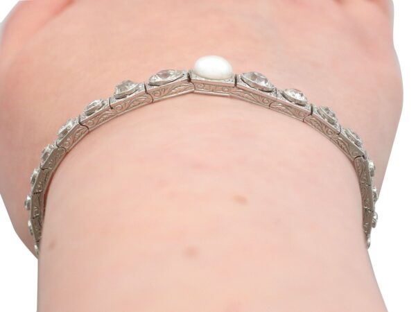 diamond and pearl line bracelet white gold on wrist