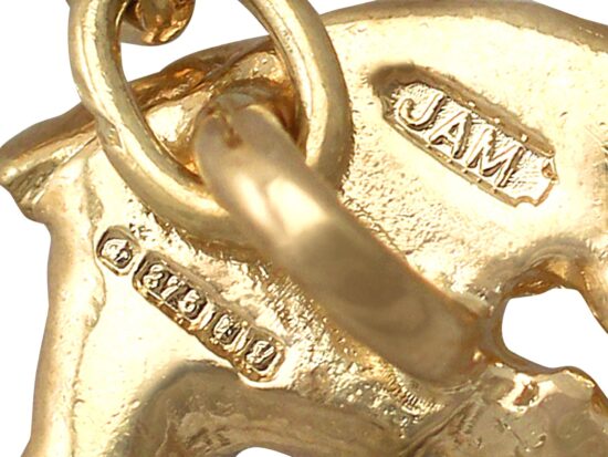 gold hallmarks on footballer cufflink