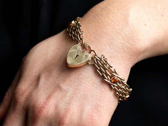 wearing citrine gate bracelet with heart padlock