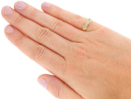 wearing Five Stone Diamond Band
