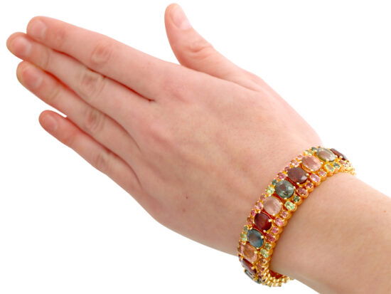 wearing gold tourmaline peridot bracelet