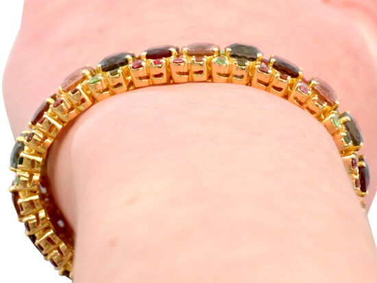 gold tourmaline peridot bracelet on wrist