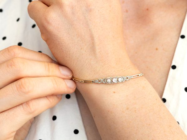 Gold and Diamond Bracelet On Wrist