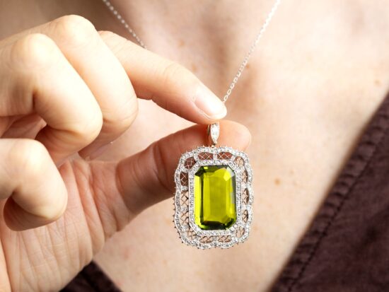 wearing peridot pendant