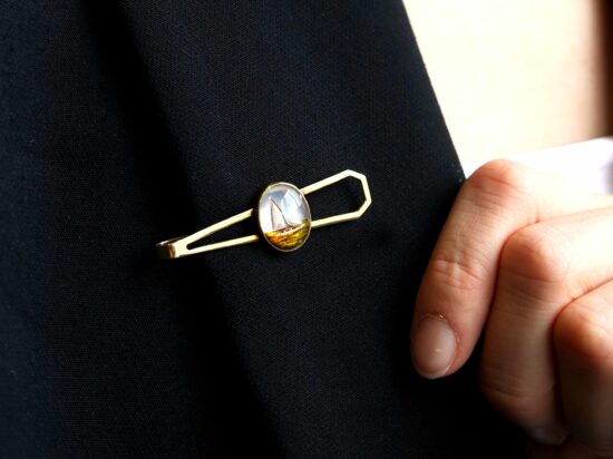 wearing a crystal tie pin