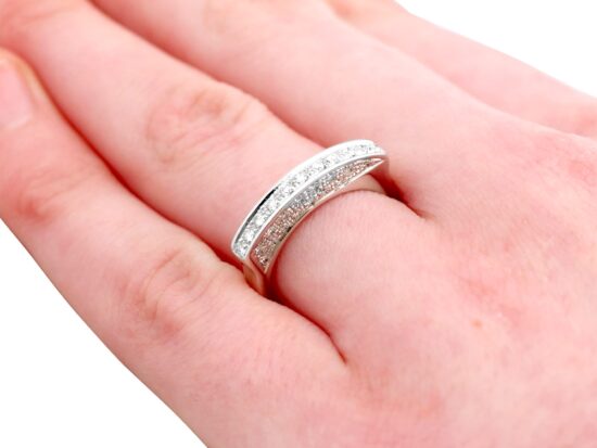 Unusual Half Eternity Ring in White Gold on hand