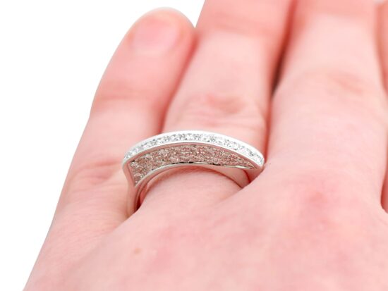 Unusual Half Eternity Ring in White Gold on finger