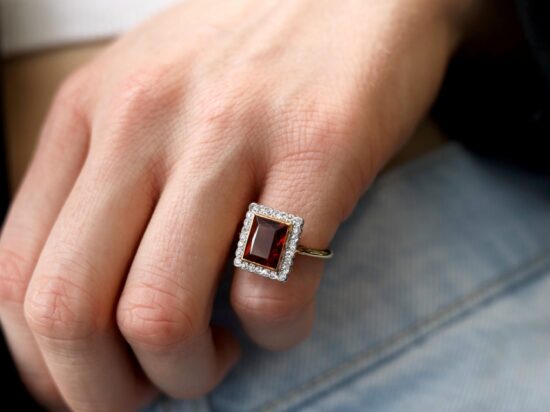 square citrine cluster ring on finger