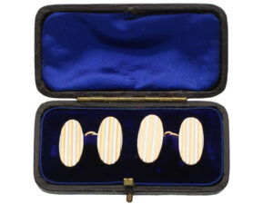 gold and platinum oval cufflinks boxed