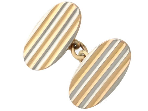 gold and platinum oval cufflink