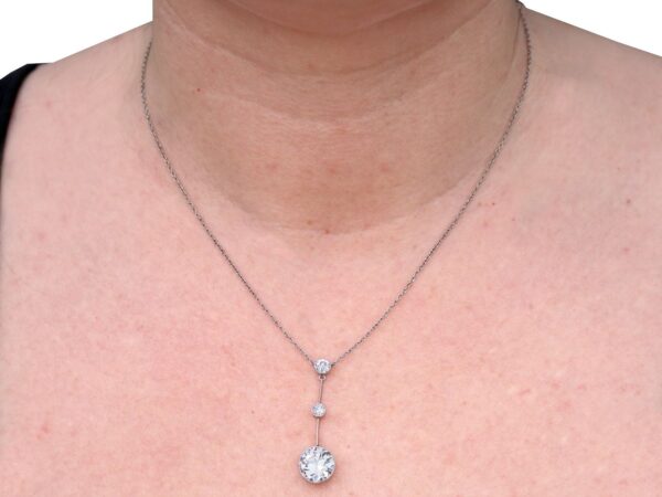 wearing 1920s 3 diamond drop pendant necklace