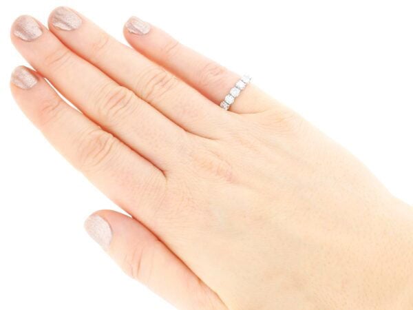 18ct white gold half eternity ring on hand