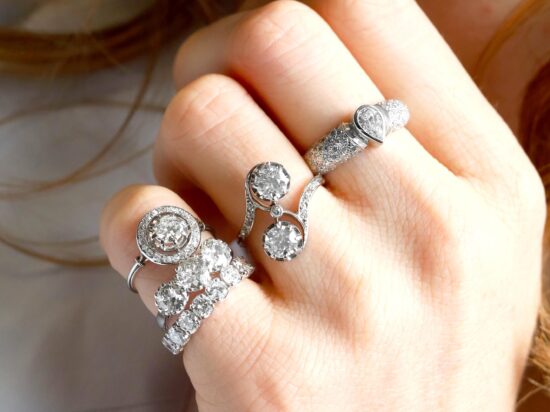 Diamond and White Gold Rings On Hand