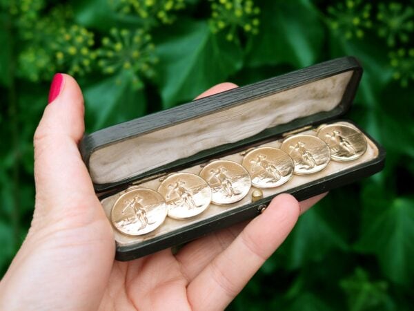 antique gold golf buttons outside